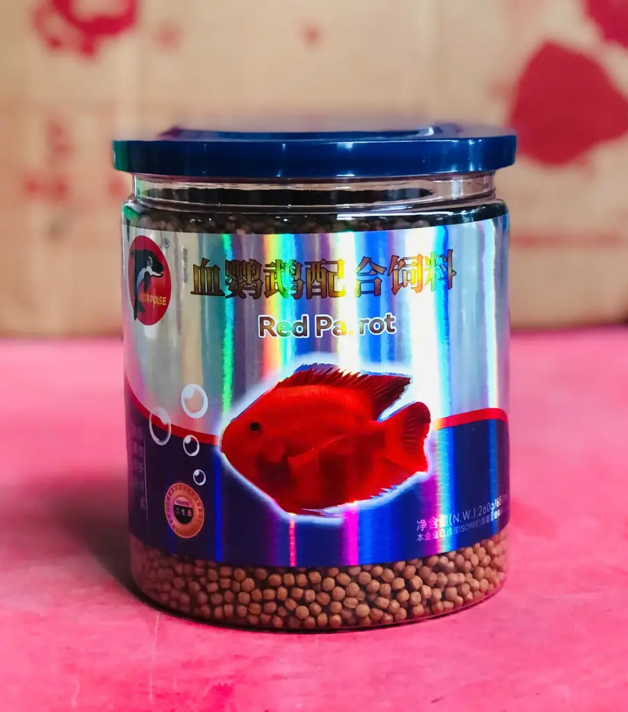 Porpoise Red Parrot 260g (nắp xanh) Thức Ăn Cá Hồng Két