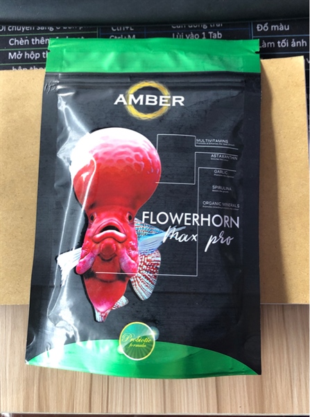 Amber Max Pro (Xanh 100gr) Thức Ăn Cá La Hán lên đầu, màu nền khi đến giai đoạn 2 ngón